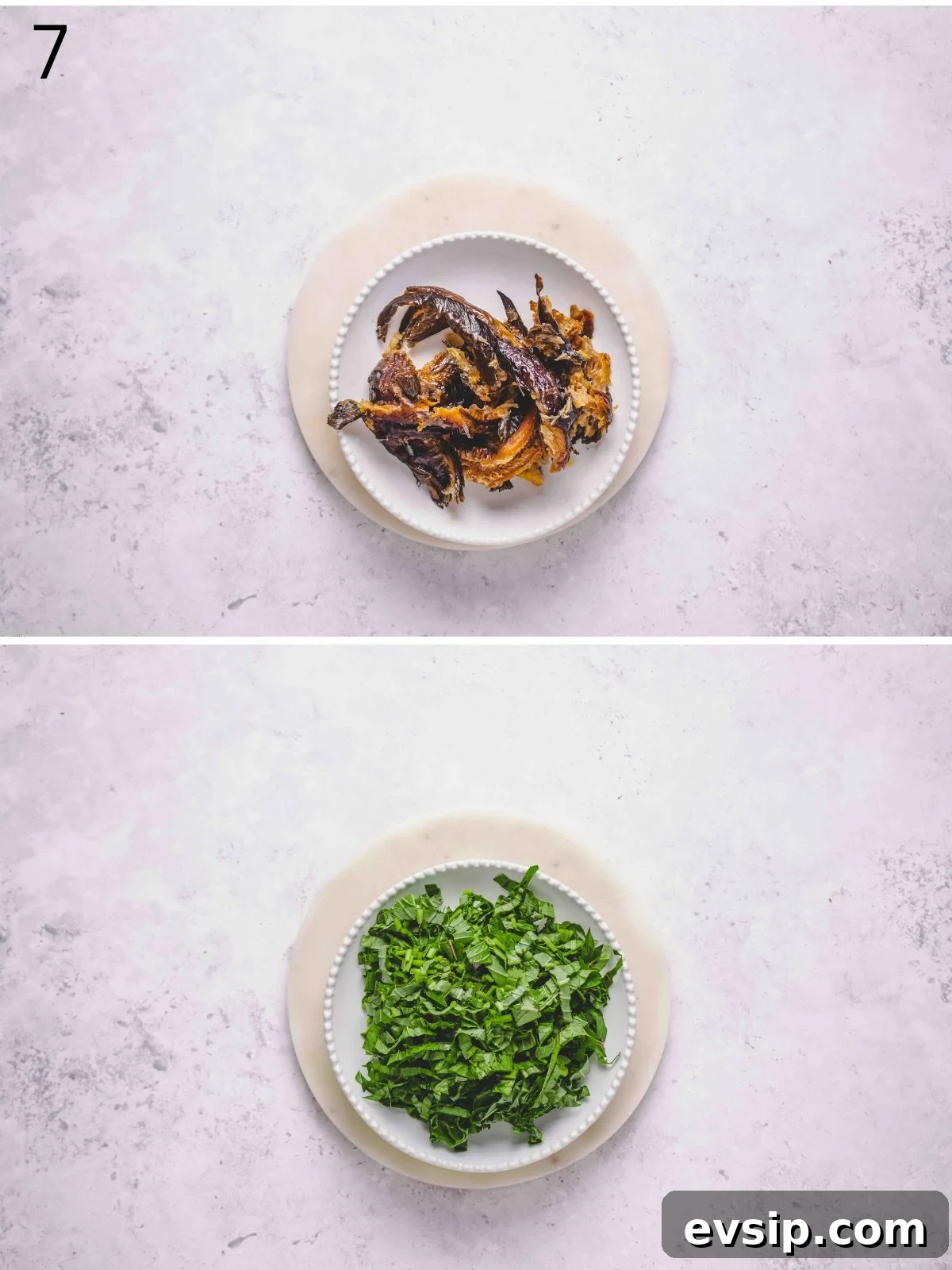 cleaned dry fish and chopped amaranth green on a plate.