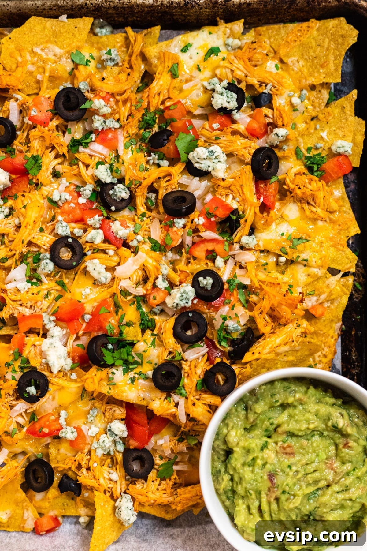 Buffalo Chicken Nachos Recipe for Crispy, Spicy Game Day Nachos 7 Baked Buffalo chicken nachos