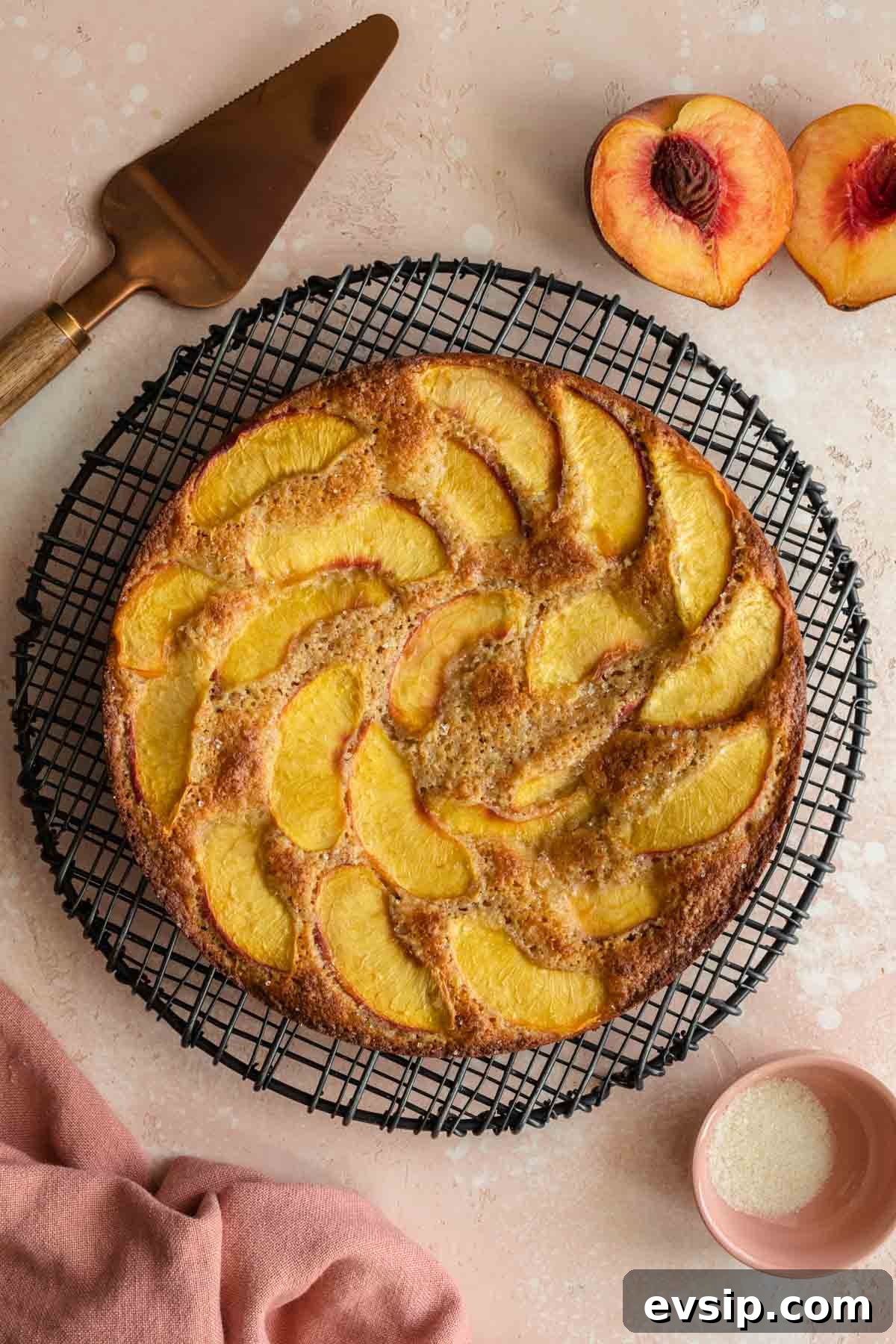 Peach Ricotta Cake Recipe — Moist Summer Fruit Dessert 8 Overhead of peach cake on a round cooling rack.