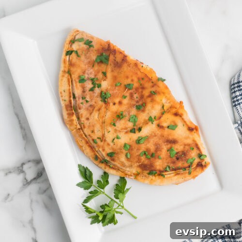 Top Blackstone Griddle Appetizers for Parties and Game Day 17 Grilled Calazone on a platter