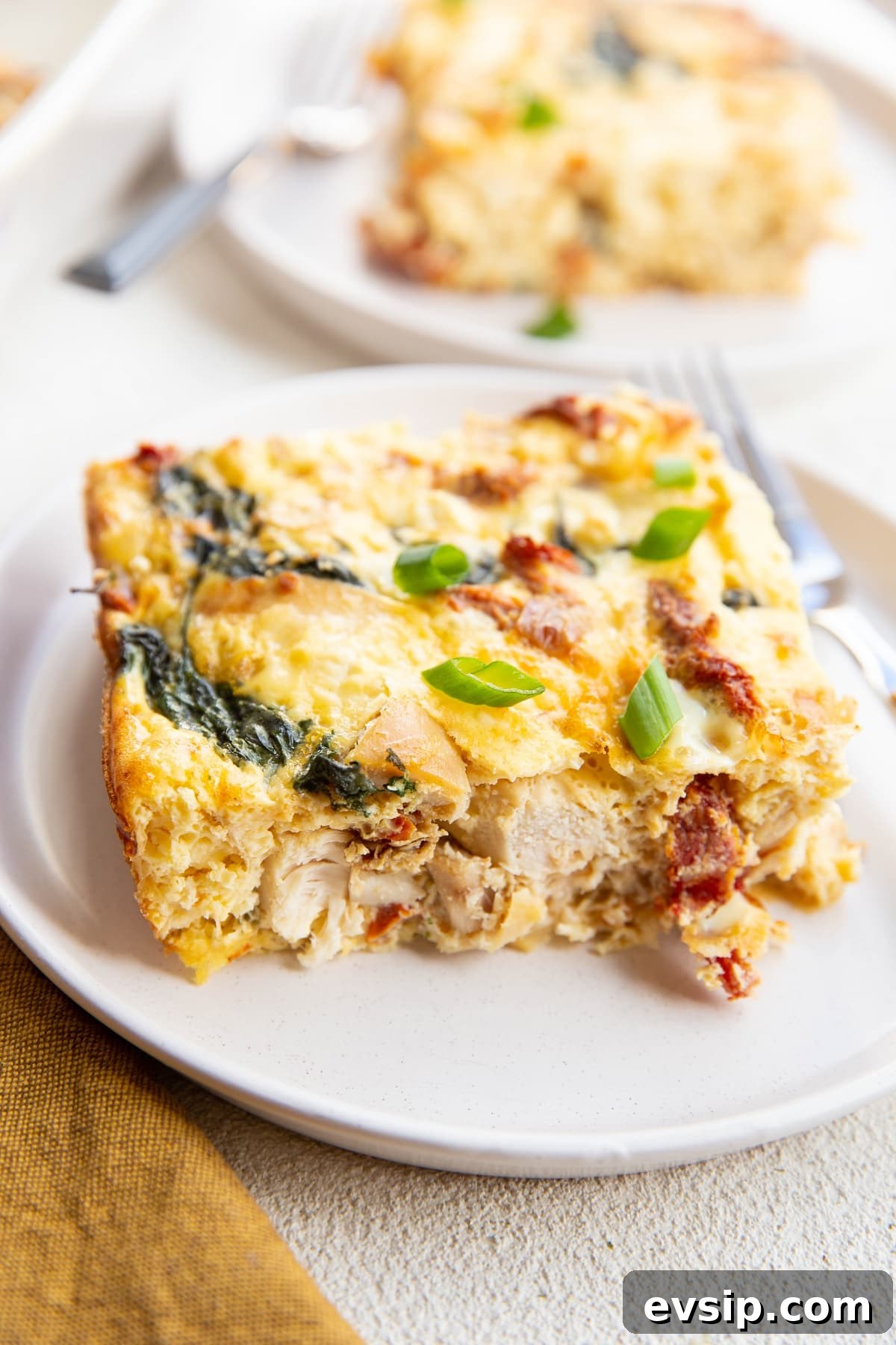 Close up on chicken and spinach egg casserole.