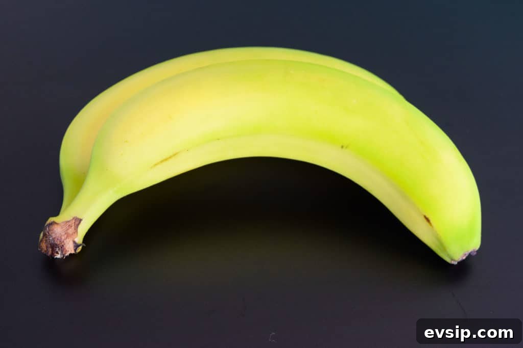 a banana on black background