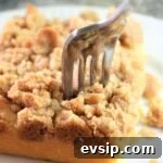 gluten free crumb cake piece with a fork in it
