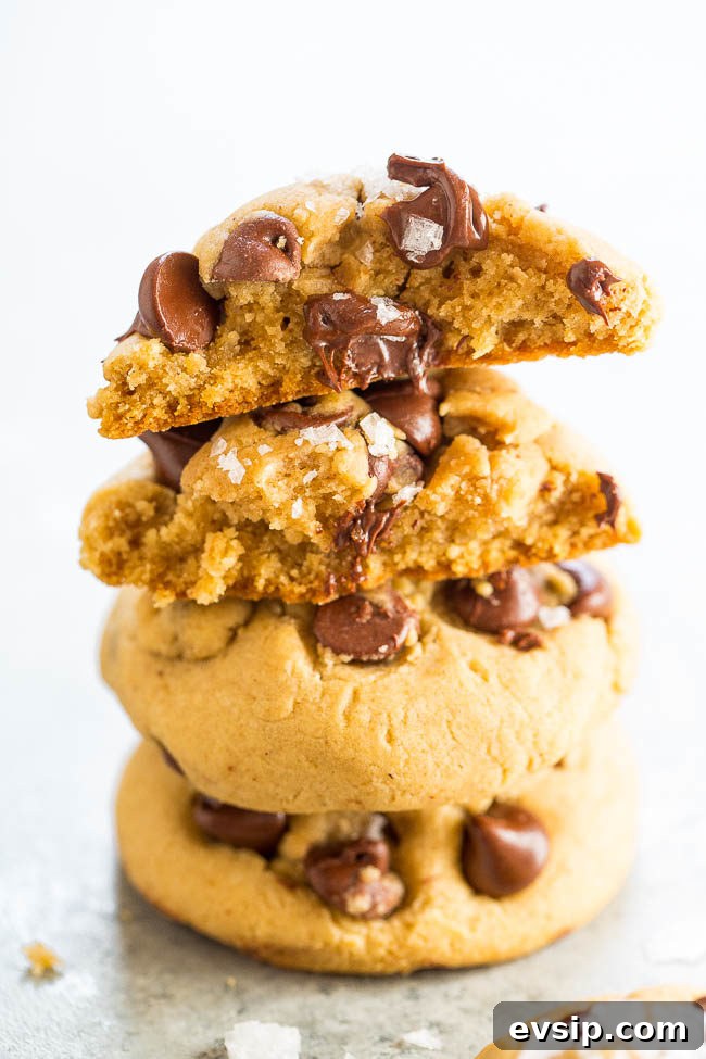 Chewy Chocolate Chip & Peanut Butter Chip Cookie Recipe 15 A stack of browned butter salted chocolate chip cookies.