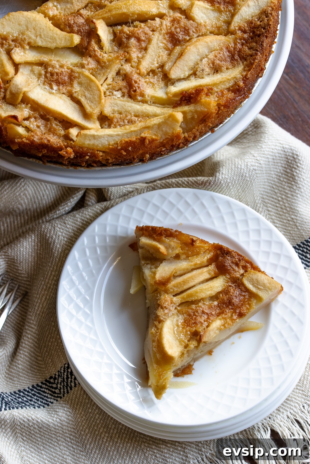 pear cake slice on a white plate