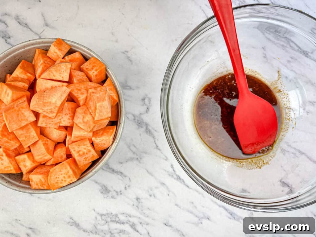 Toss sweet potatoes with oil, chili powder, orange zest, and salt in a large bowl.