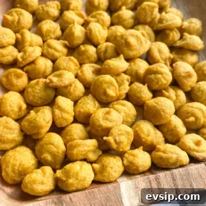 15 Kid-Friendly Pumpkin Recipes for Fall 16 Pumpkin puffs served on a wooden plate