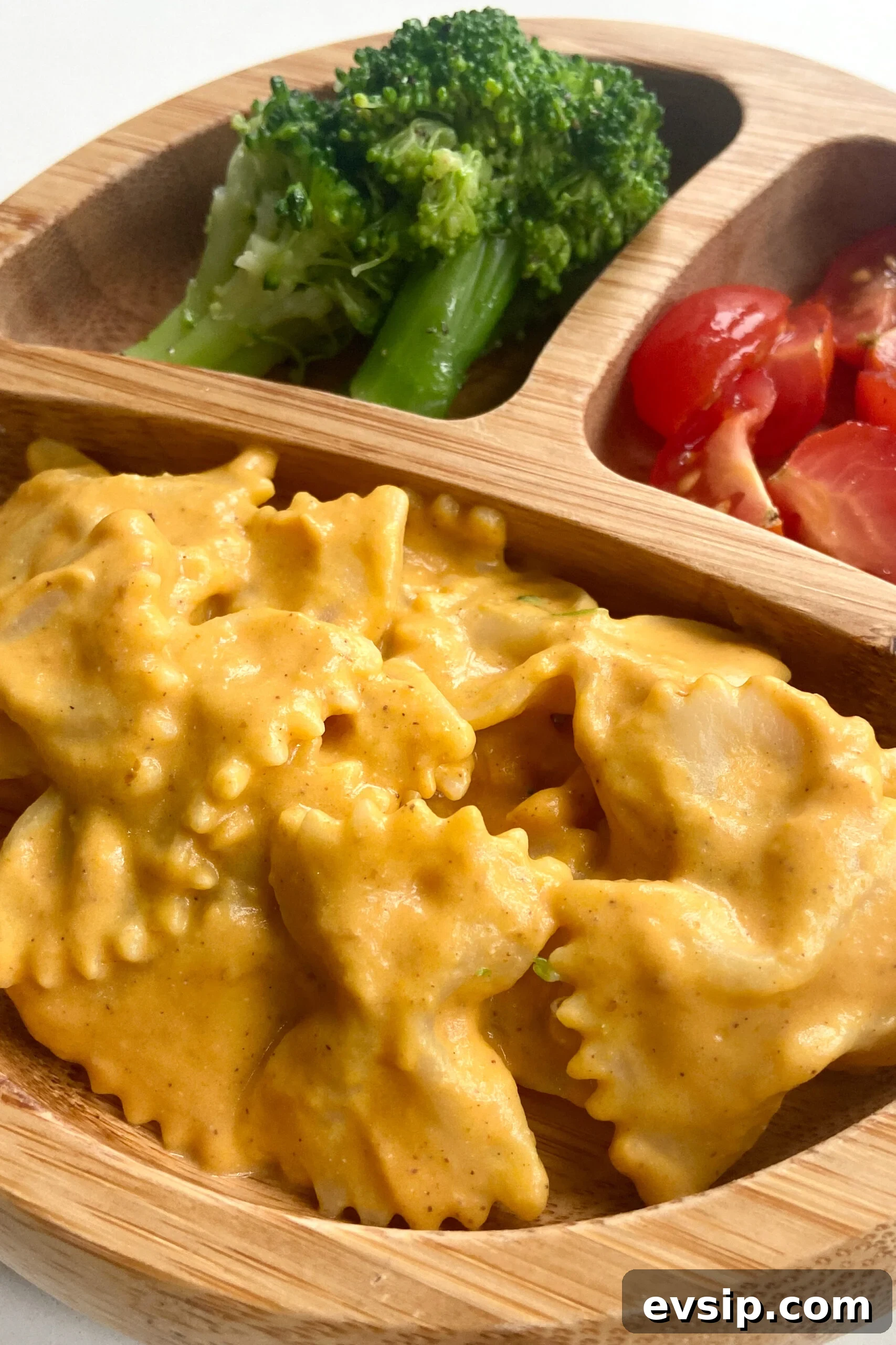 15 Kid-Friendly Pumpkin Recipes for Fall 17 Creamy pumpkin pasta served with broccoli and quartered tomatoes