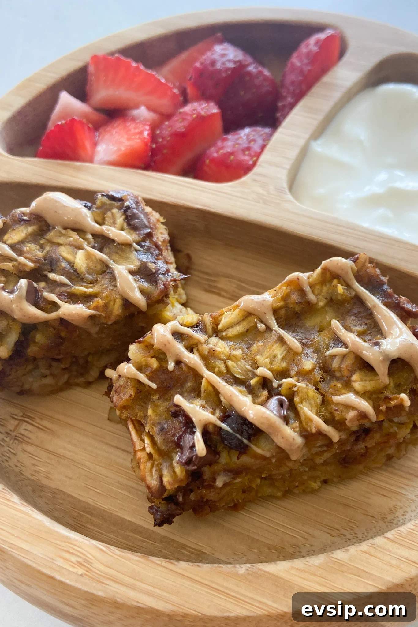 15 Kid-Friendly Pumpkin Recipes for Fall 19 Pumpkin oatmeal bars served with berries and yogurt.