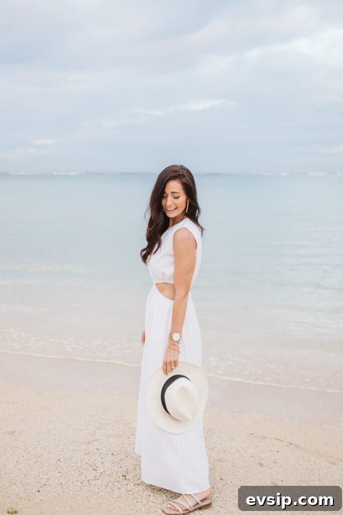 Tori in the Monaco White Cut-Out Dress in the water of Hawaii
