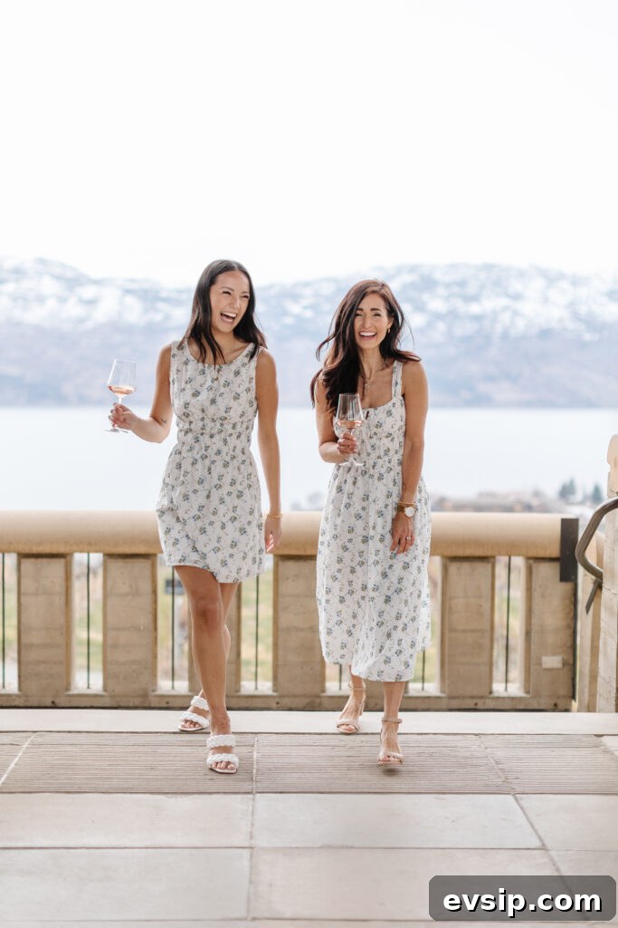 Tori and Victoria walking in a short and long floral dress at a winery