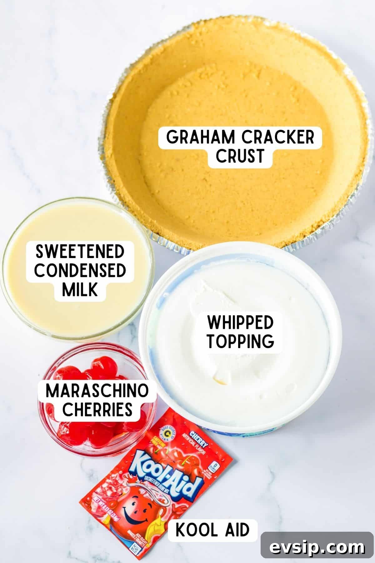 Graham cracker pie crust, sweetened condensed milk, whipped topping, maraschino cherries and packet of kool aid.
