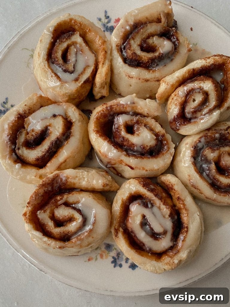 gluten free cinnamon rolls on a floral plate