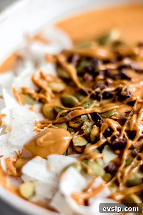 Close-up of a fall glow smoothie bowl.