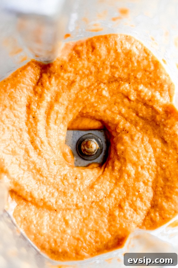 Blended up smoothie ingredients in a blender.