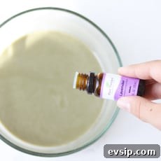 lavender essential oil being added to homemade anti-itch cream
