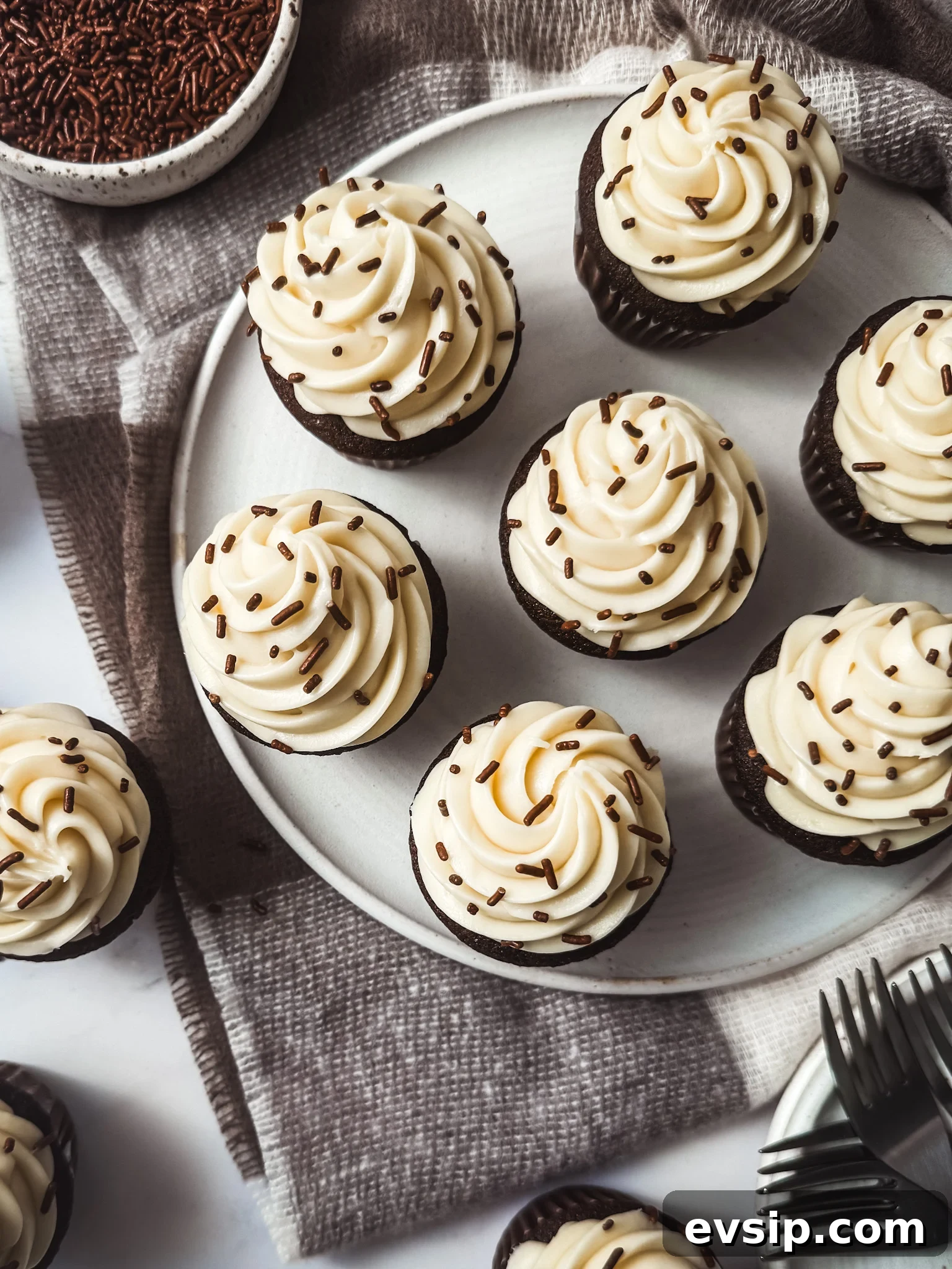Decadent Chocolate Cupcakes with Cream Cheese Frosting 3 Cupcakes on a rack