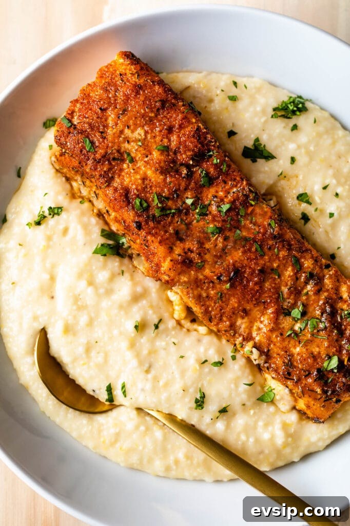 Blackened Baked Salmon with Creamy Cheddar Grits 2 baked blackened salmon fish and grits
