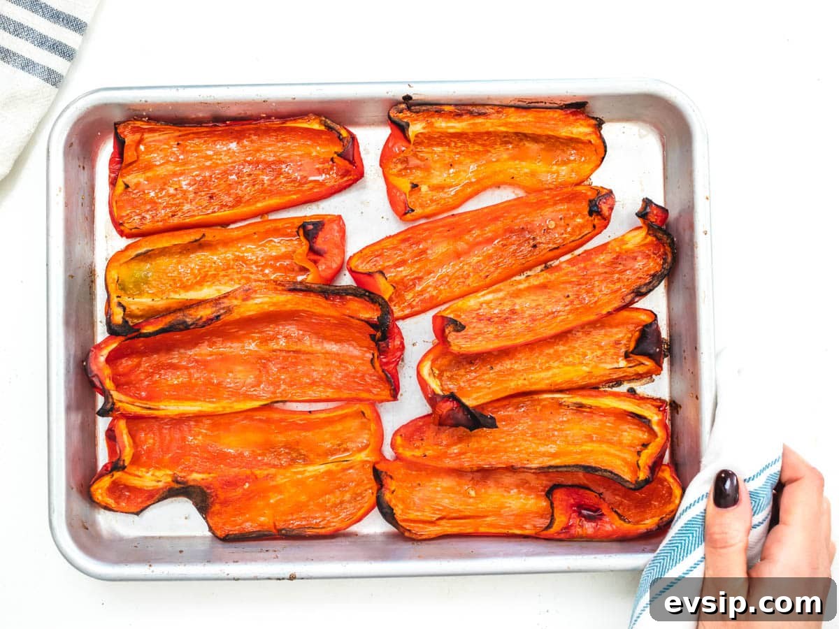 red bell pepper after roasting in the oven on a baking tray