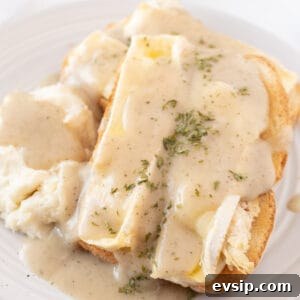 hot turkey sandwich with gravy on plate close up featured image
