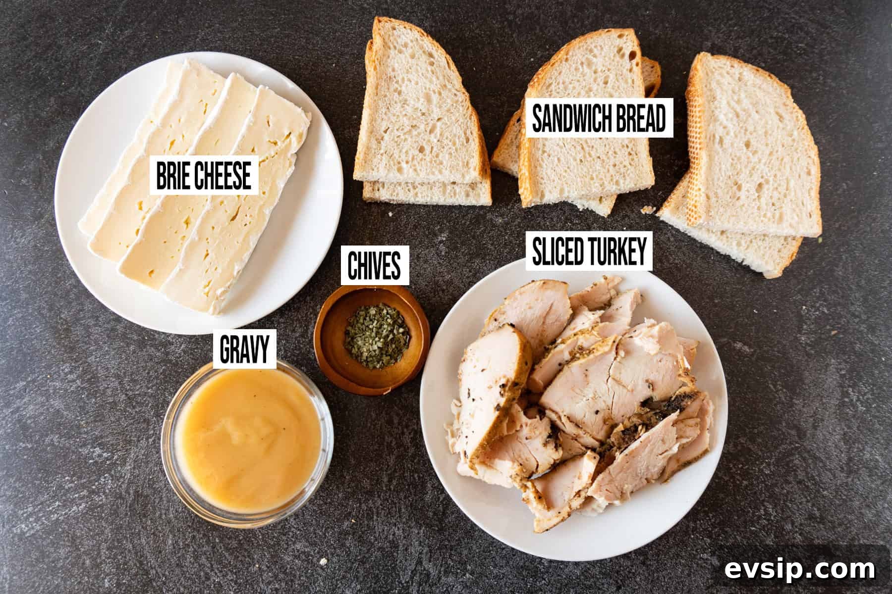 Hot Open Faced Turkey Sandwiches ingredients laid out and in individual bowls and labeled.
