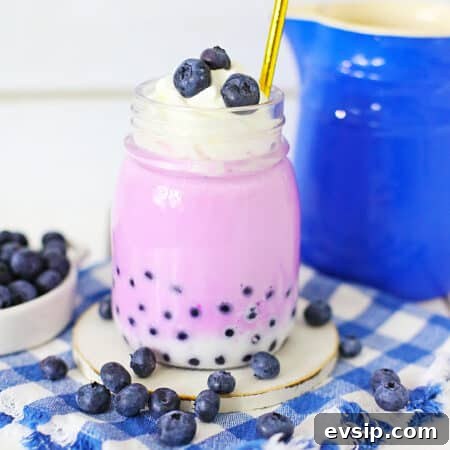 Blueberry Milk Tea inside a glass cup