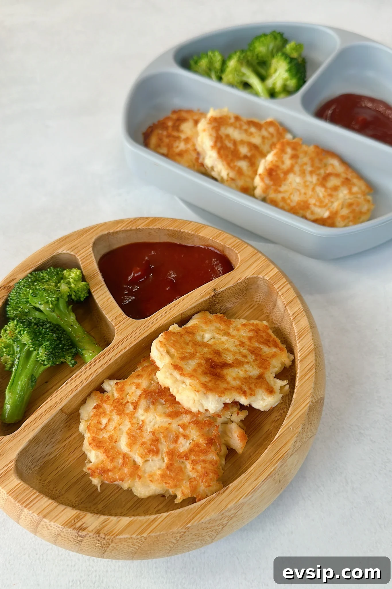 Crispy Chicken Fritters Made with Leftover Roast Chicken 6 Chicken fritters served with broccoli and ketchup.