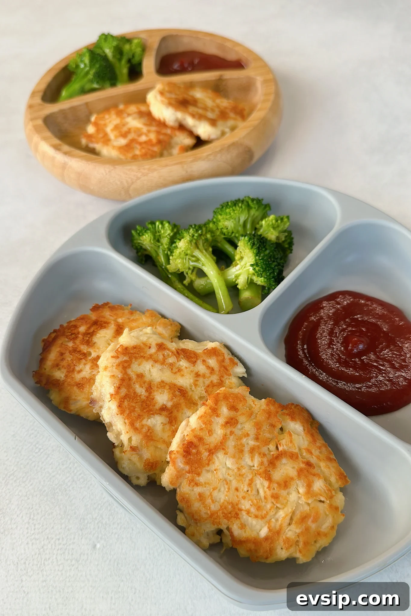 Crispy Chicken Fritters Made with Leftover Roast Chicken 7 Chicken fritters served with broccoli and ketchup.