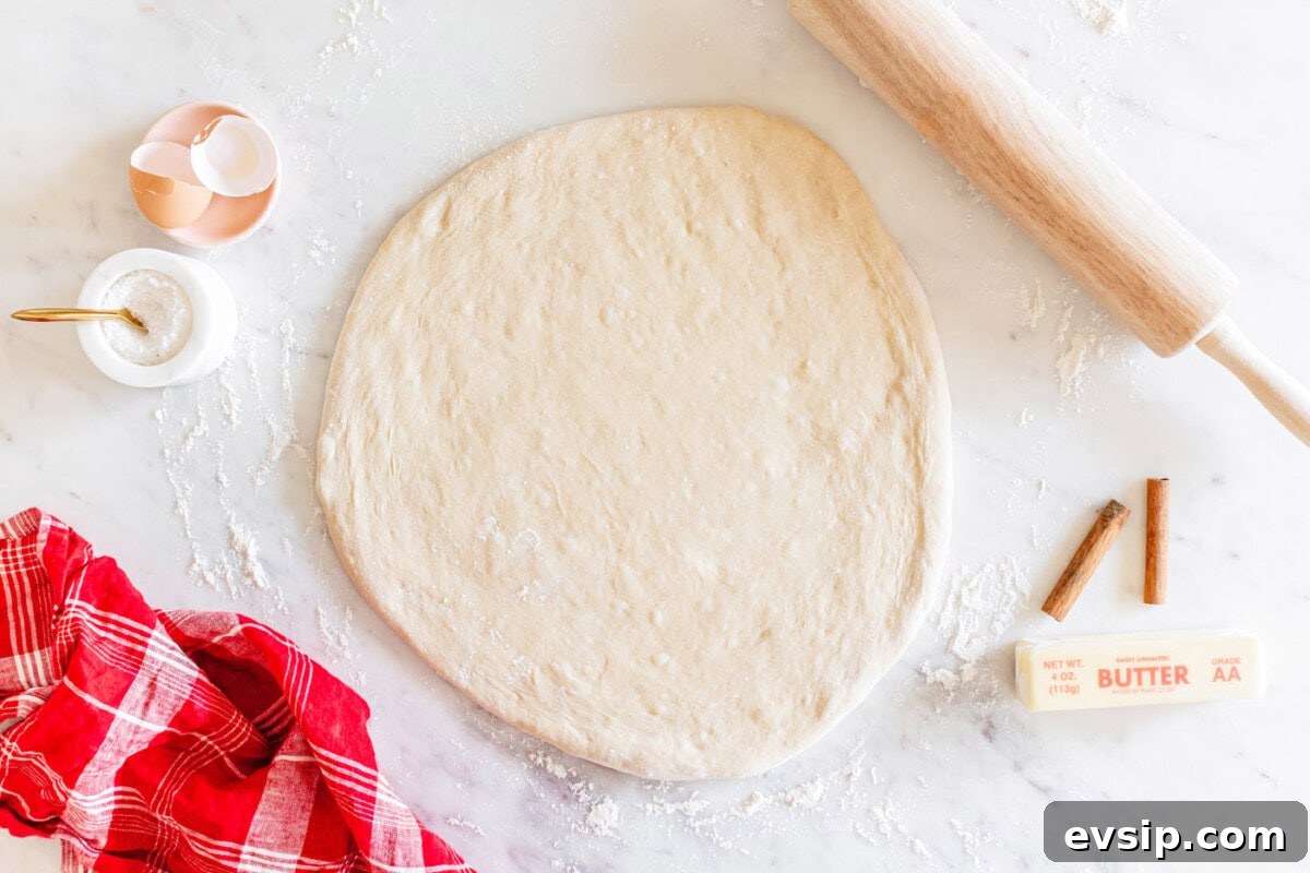 dough rolled flat on a surface