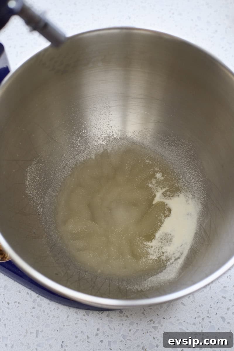 Chocolate Marshmallows Recipe: Homemade Gooey Chocolate Mallows 5 Gelatin blooming in the bowl of a stand mixer.