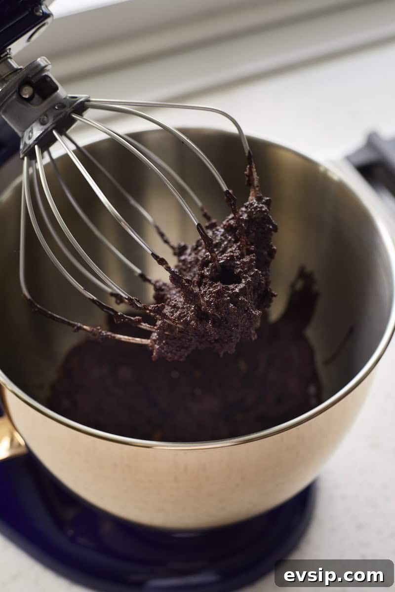 Chocolate Marshmallows Recipe: Homemade Gooey Chocolate Mallows 7 Chocolate and gelatin mixture on a whisk.