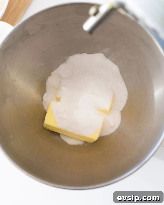 Butter and sugar in a stand mixer bowl.
