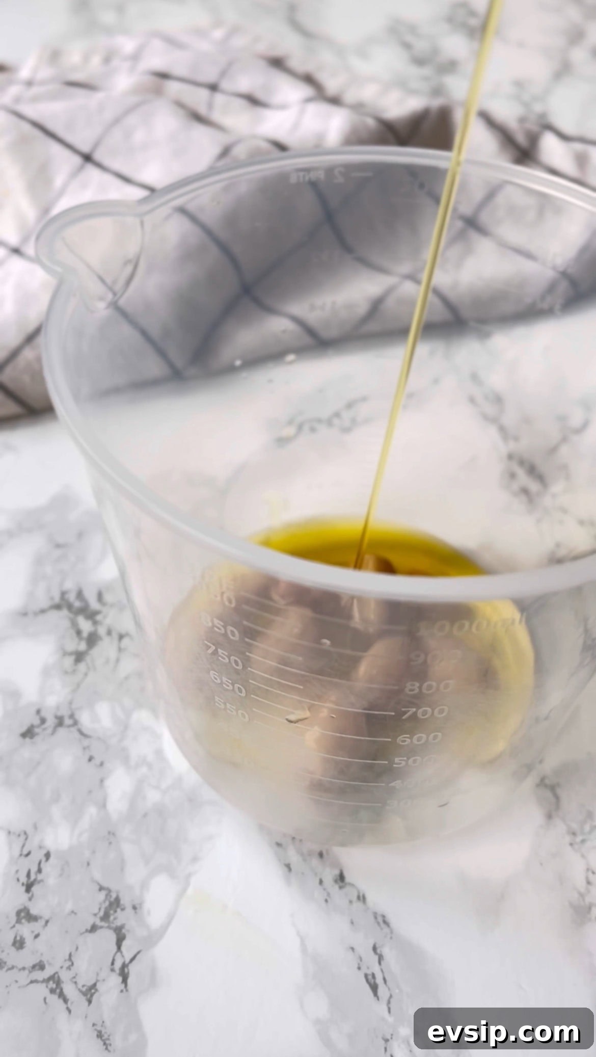 Mortadella & Burrata Sandwich Recipe – Creamy Italian Panino 4 adding oil to make roasted garlic aioli