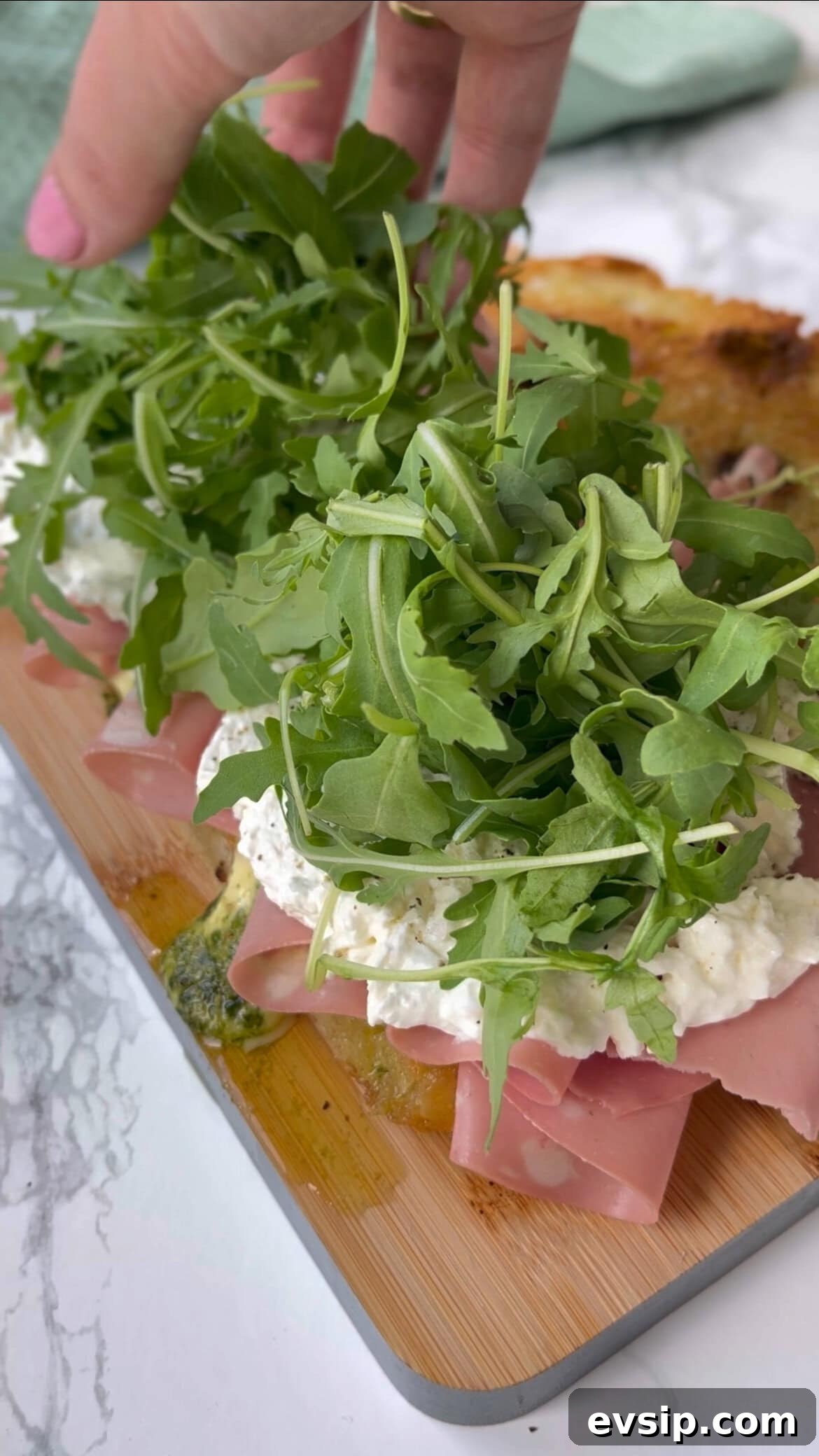 Mortadella & Burrata Sandwich Recipe – Creamy Italian Panino 9 adding rocket to mortadella burrata sandwich