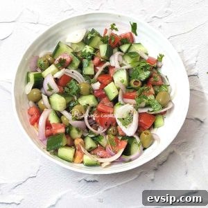 Mediterranean Cucumber and Tomato Salad Recipe for Summer 11 Mediterranean cucumber tomato salad in a bowl.