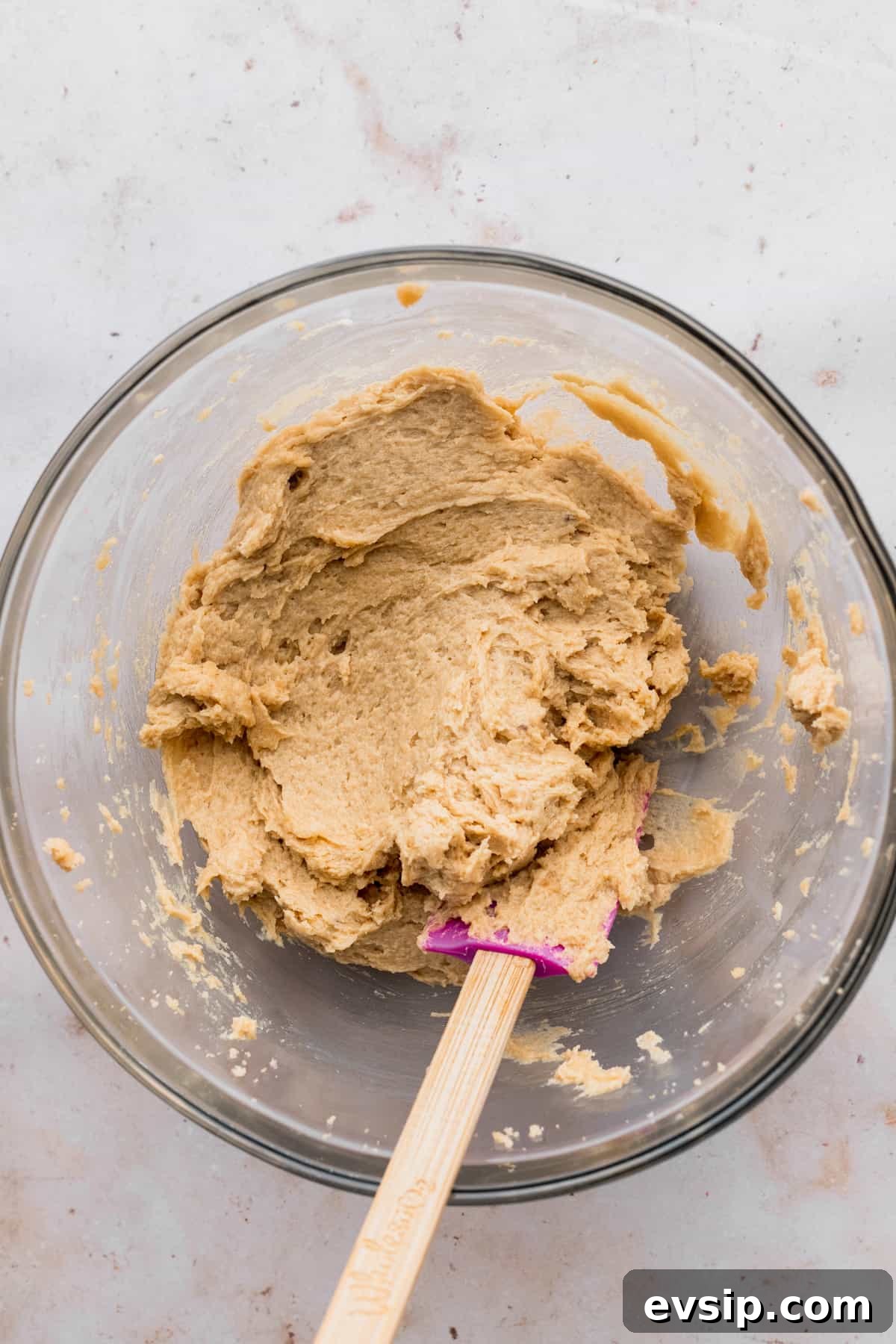 Bite-Sized Mini Egg Cookies with Chocolate Candy Centers 4 Wet ingredients beaten in a bowl.