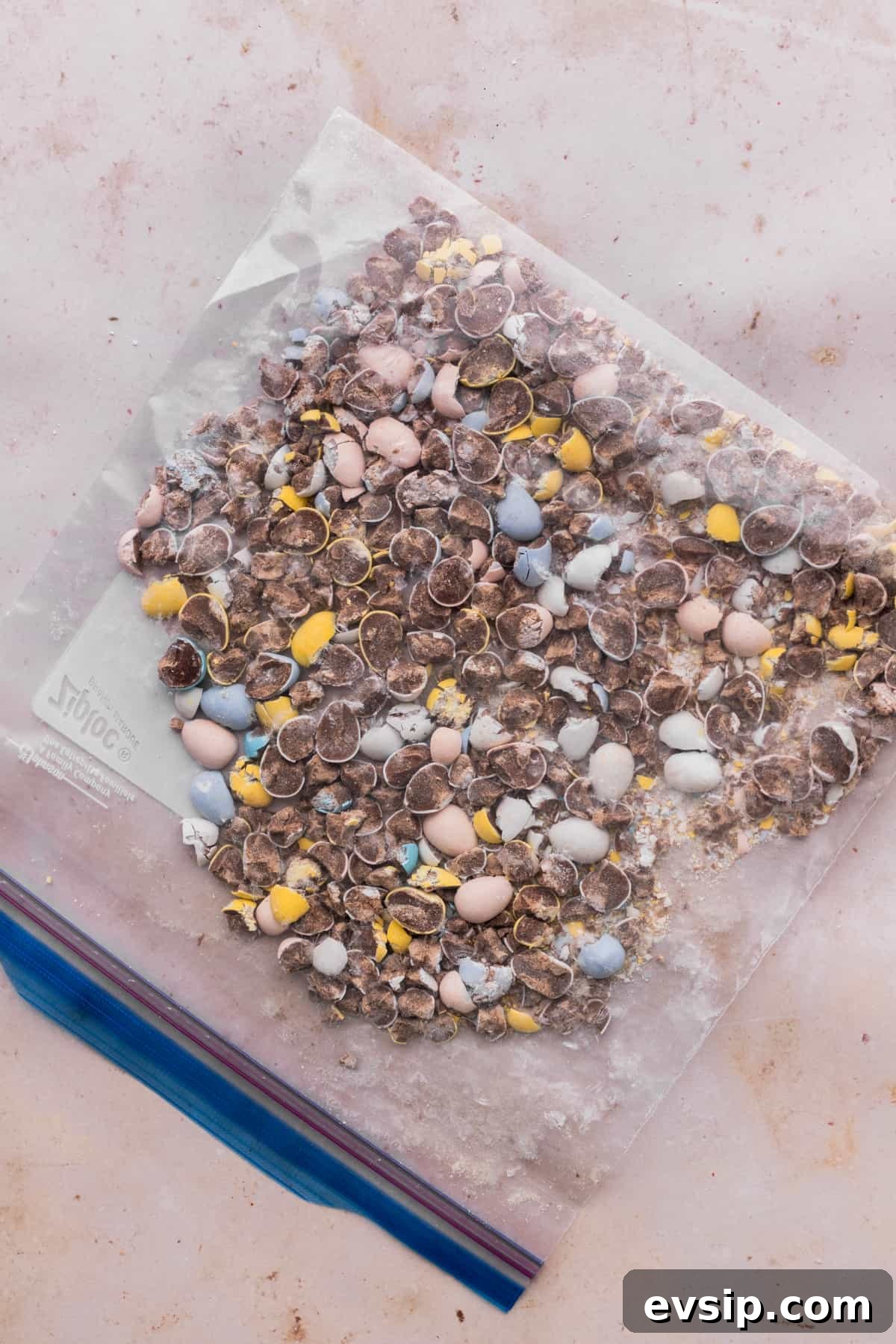 Bite-Sized Mini Egg Cookies with Chocolate Candy Centers 5 Chopped mini eggs in a bag.