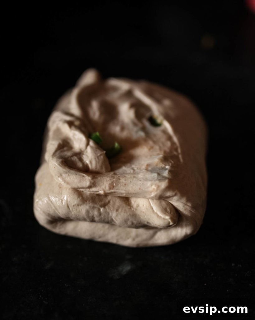 Sourdough Discard Cornmeal Loaf with Cheddar & Jalapeno 5 Lamination - second fold