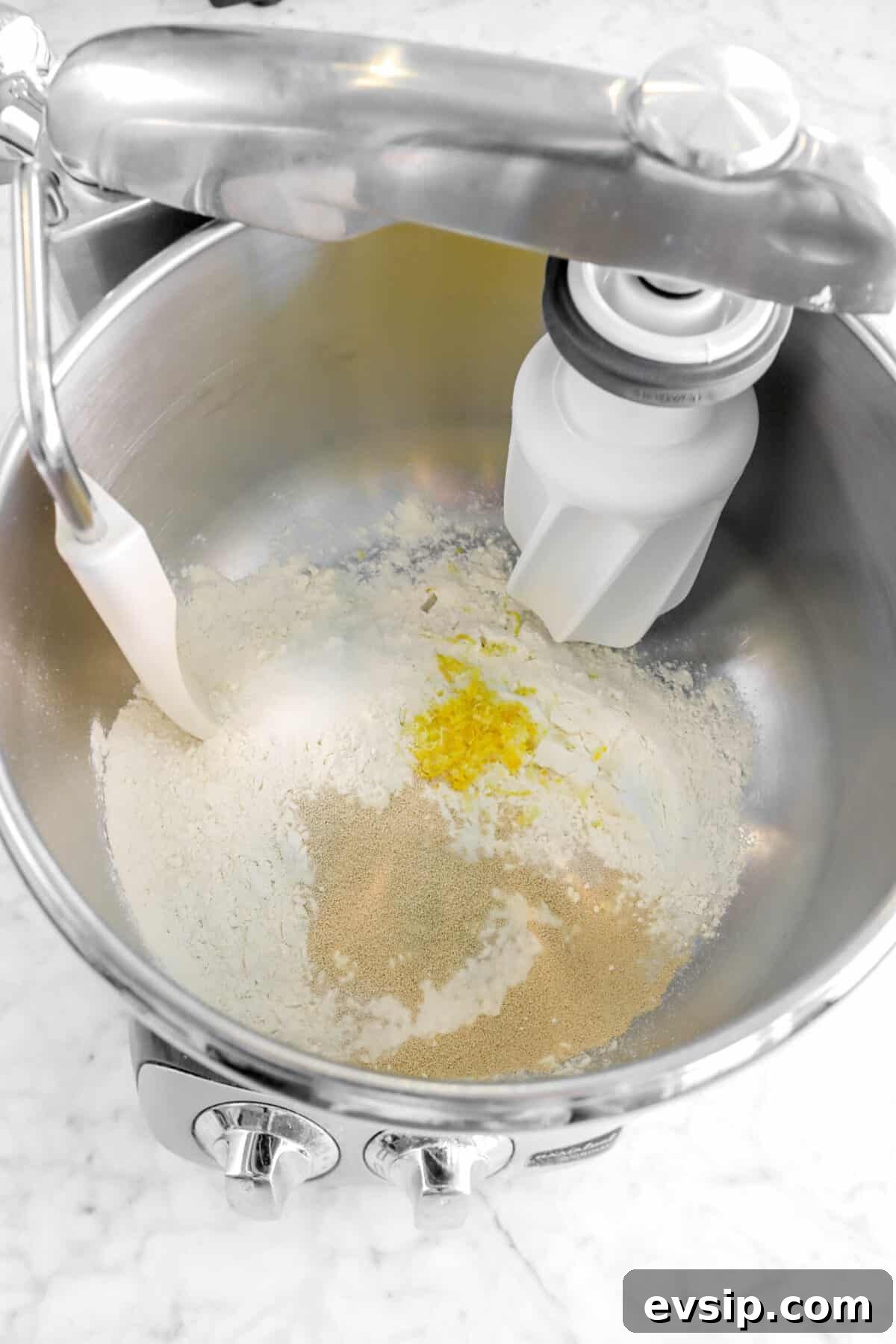 flour, yeast, zest, and salt in mixer bowl