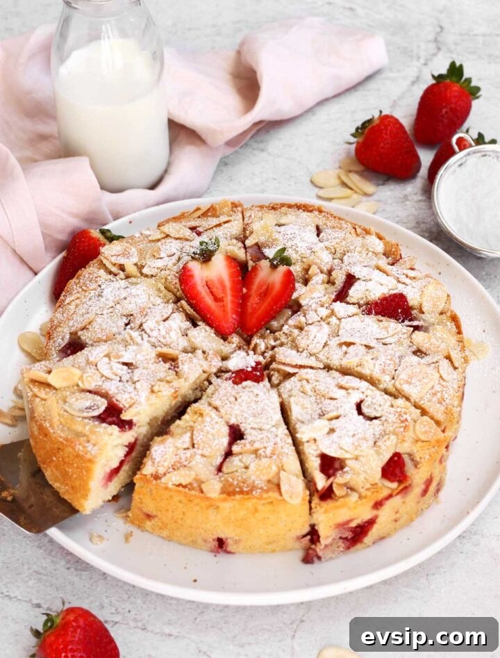 Strawberry Almond Cake Recipe with Almond Glaze 6 strawberry almond cake slice on plate