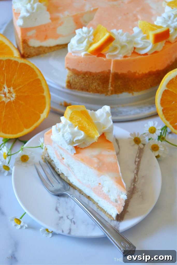 No-Bake Orange Creamsicle Cheesecake Recipe 7 orange creamsicle cheesecake and a slice with oranges and flowers