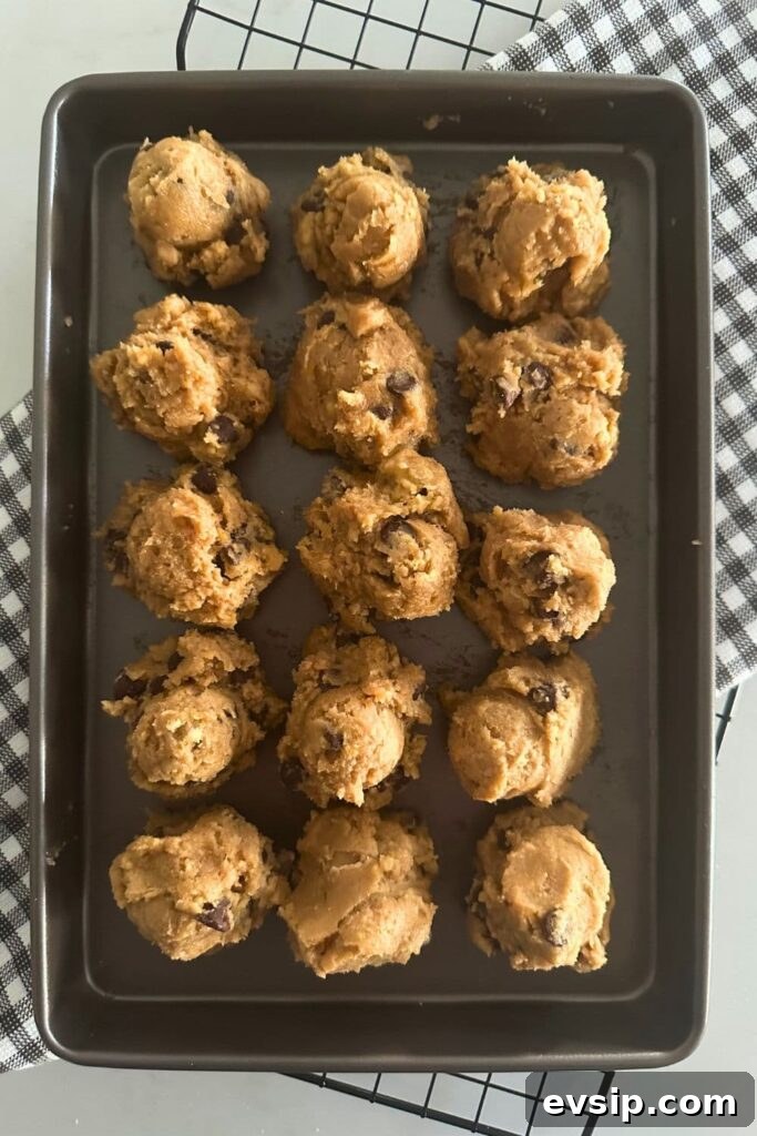 20 Sourdough Discard Recipes Perfect for Freezing 14 A baking tray containing scoops of sourdough chocolate chip cookie dough that is ready for the freezer.