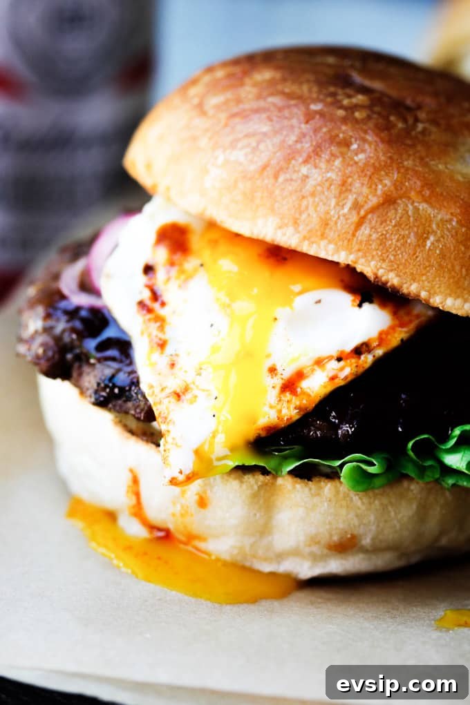 Smoky BBQ Burger with Garlic Aioli and Fried Egg Recipe 5 Smoky burger with runny egg yolk